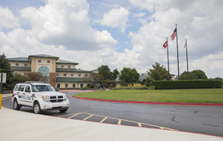 Campus Police vehicle in front of Burns Hall