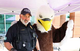 Officer with Eagle Mascot