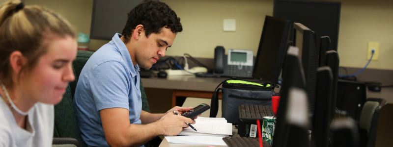 Two Students Working on Homework