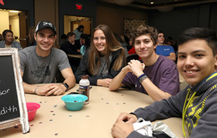 A Group of Students Sitting at a Table